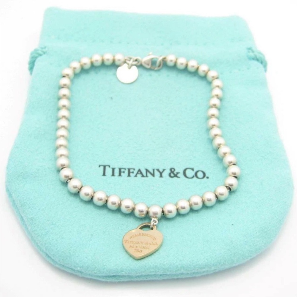 Tiffany & Co. Silver Bead Bracelet with Gold Heart Charm